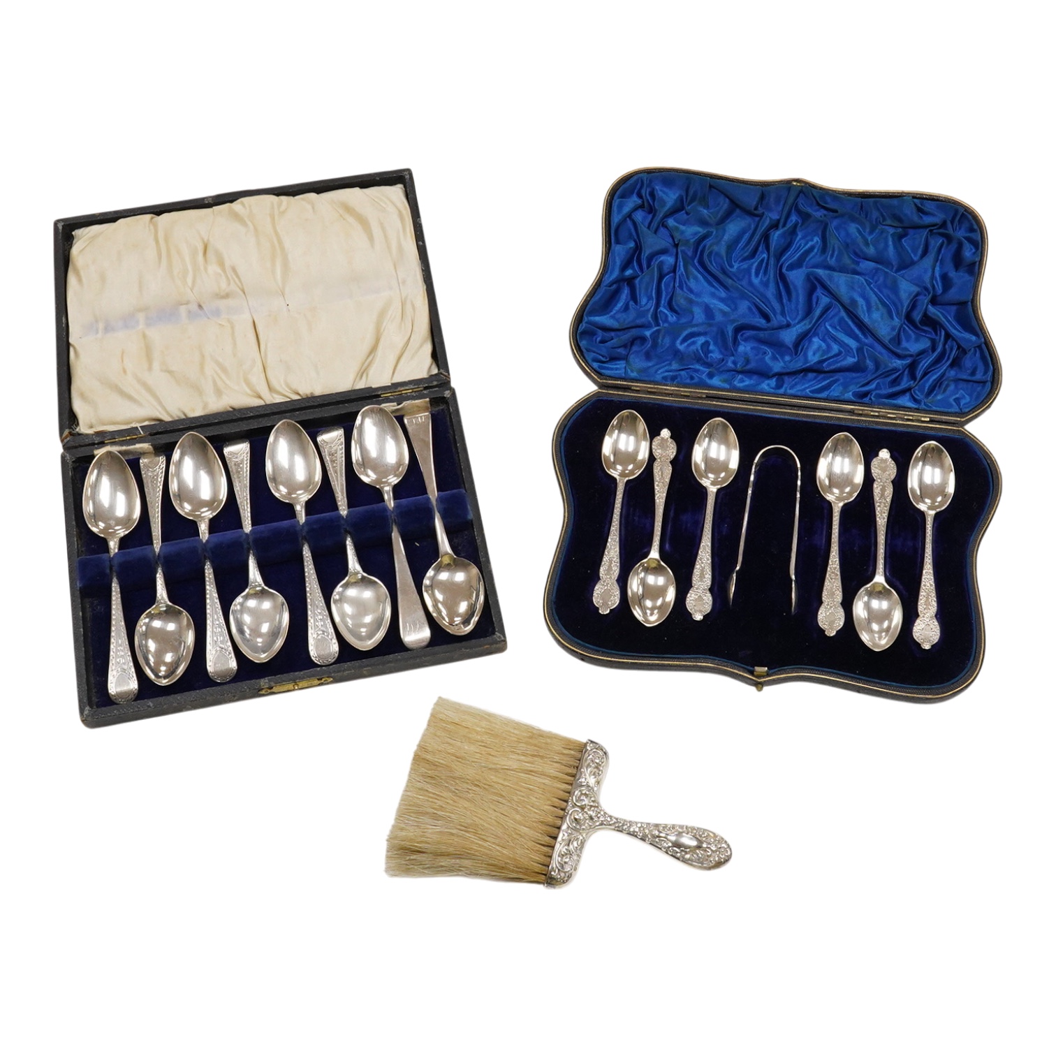 A cased set of six late Victorian engraved silver teaspoons with sugar tongs, Wakely & Wheeler, London, 1892, together with eight other silver teaspoons and a silver handled crumb brush.